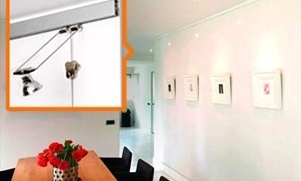 Kunst uitgelicht met STAS verlichting en ophangsystemen